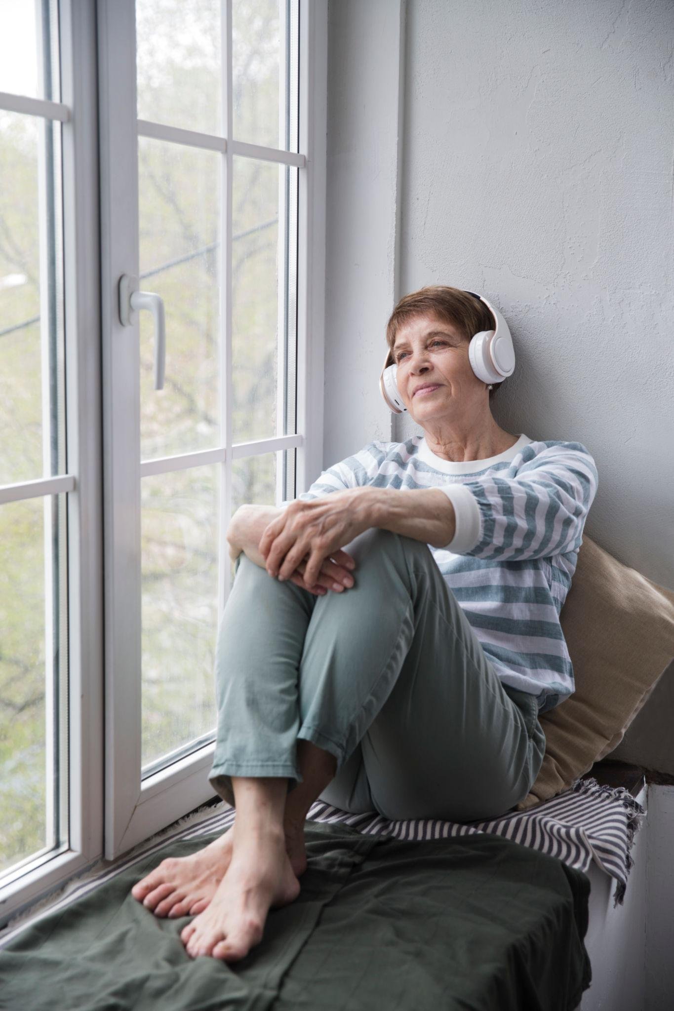 Person listening to audio with headphones